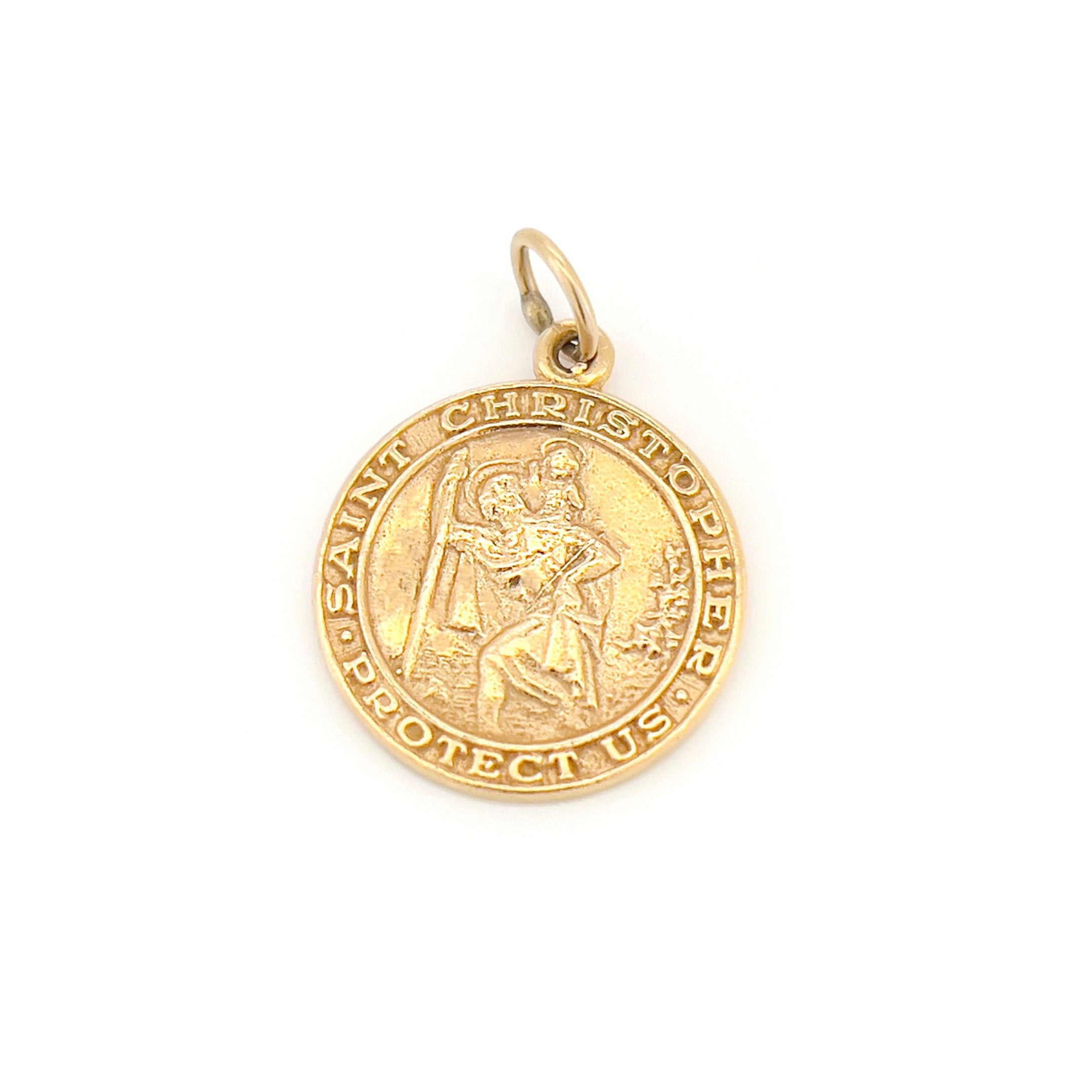 Gold Saint Christopher pendant on a white background