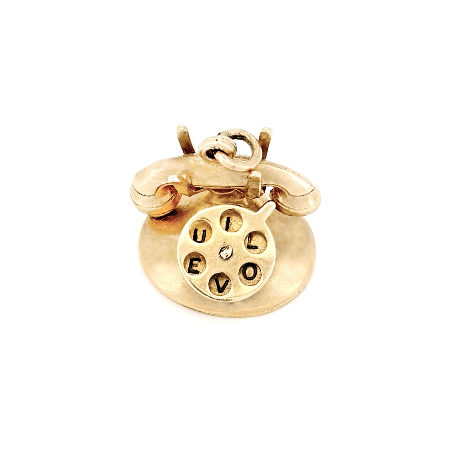 Gold charm shaped like a vintage phone with 'I Love U' on a white background