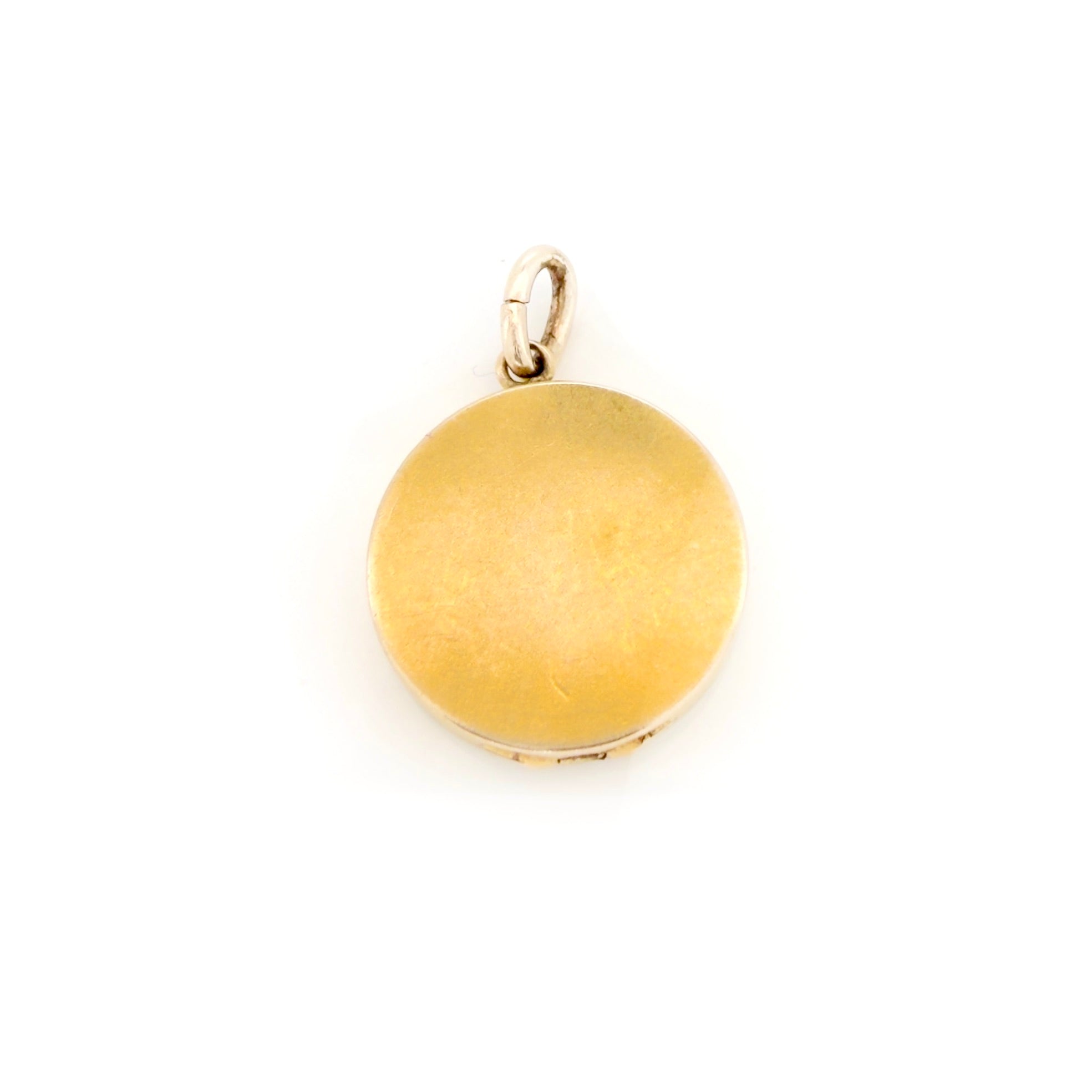 Gold pendant on a white background
