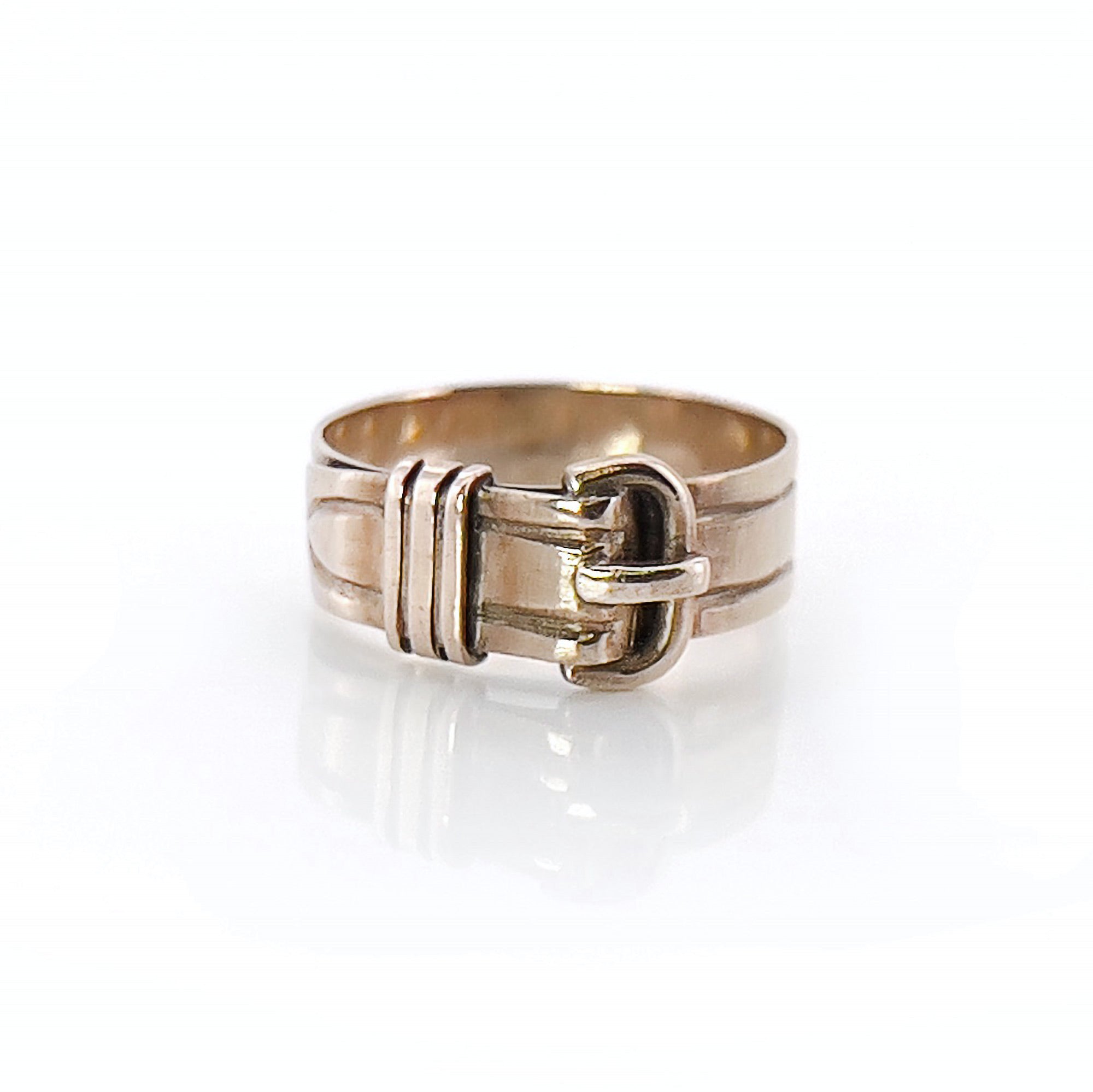 Antique Gold ring with a buckle design on a white background