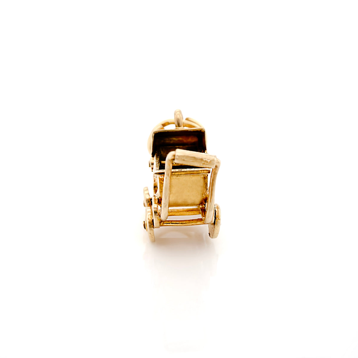 A gold vintage stroller charm, shown from a front three-quarter angle on a clean white background.
