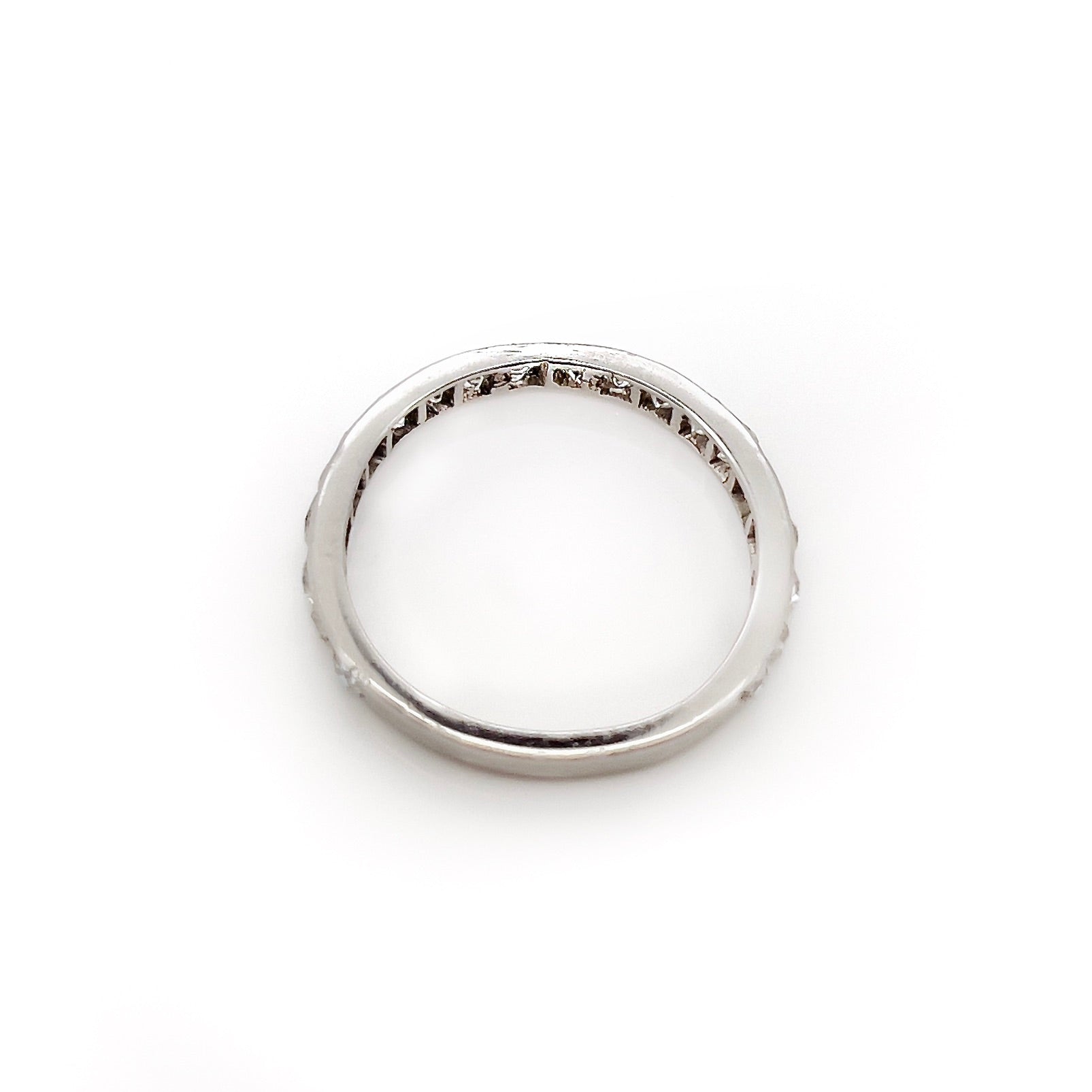 Art Deco french cut diamond band made out of platinum