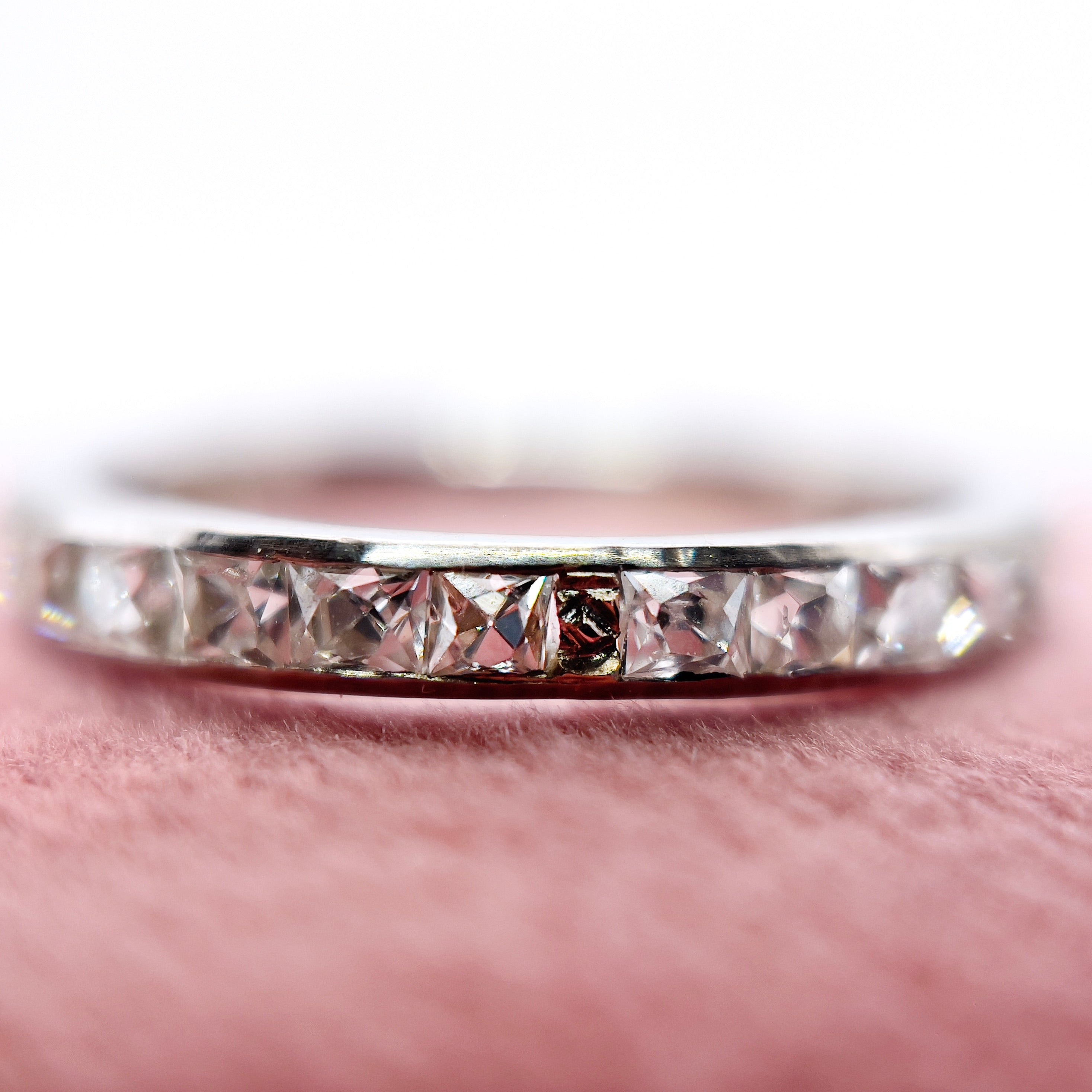 Art Deco french cut diamond band made out of platinum
