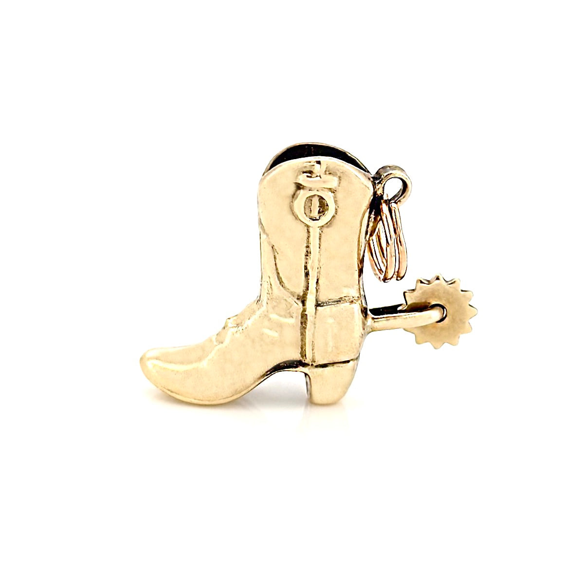 Gold cowboy boot charm on a white background