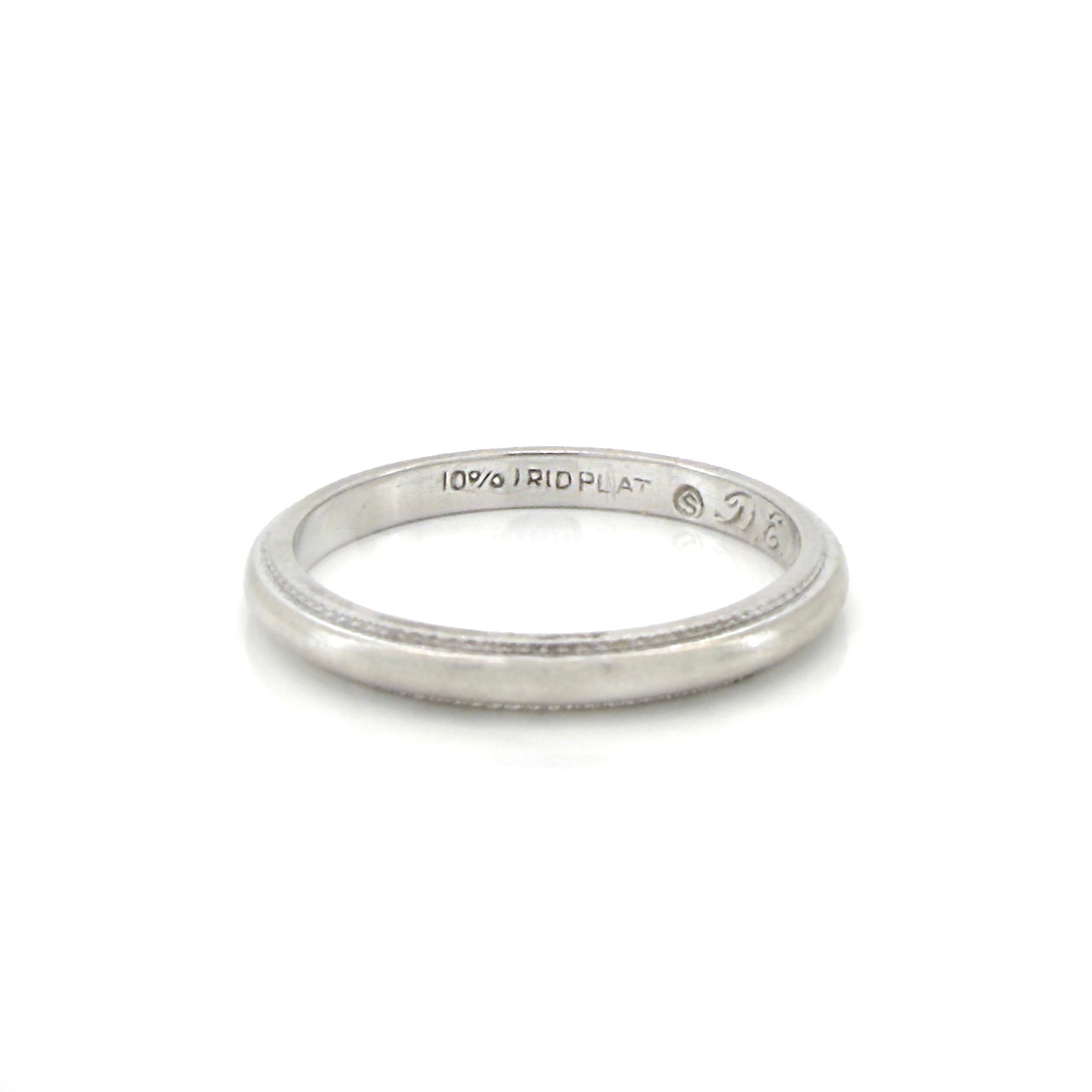 vintage silver ring with fine milgrain and a '10% IRID PLAT' stamp on a white background