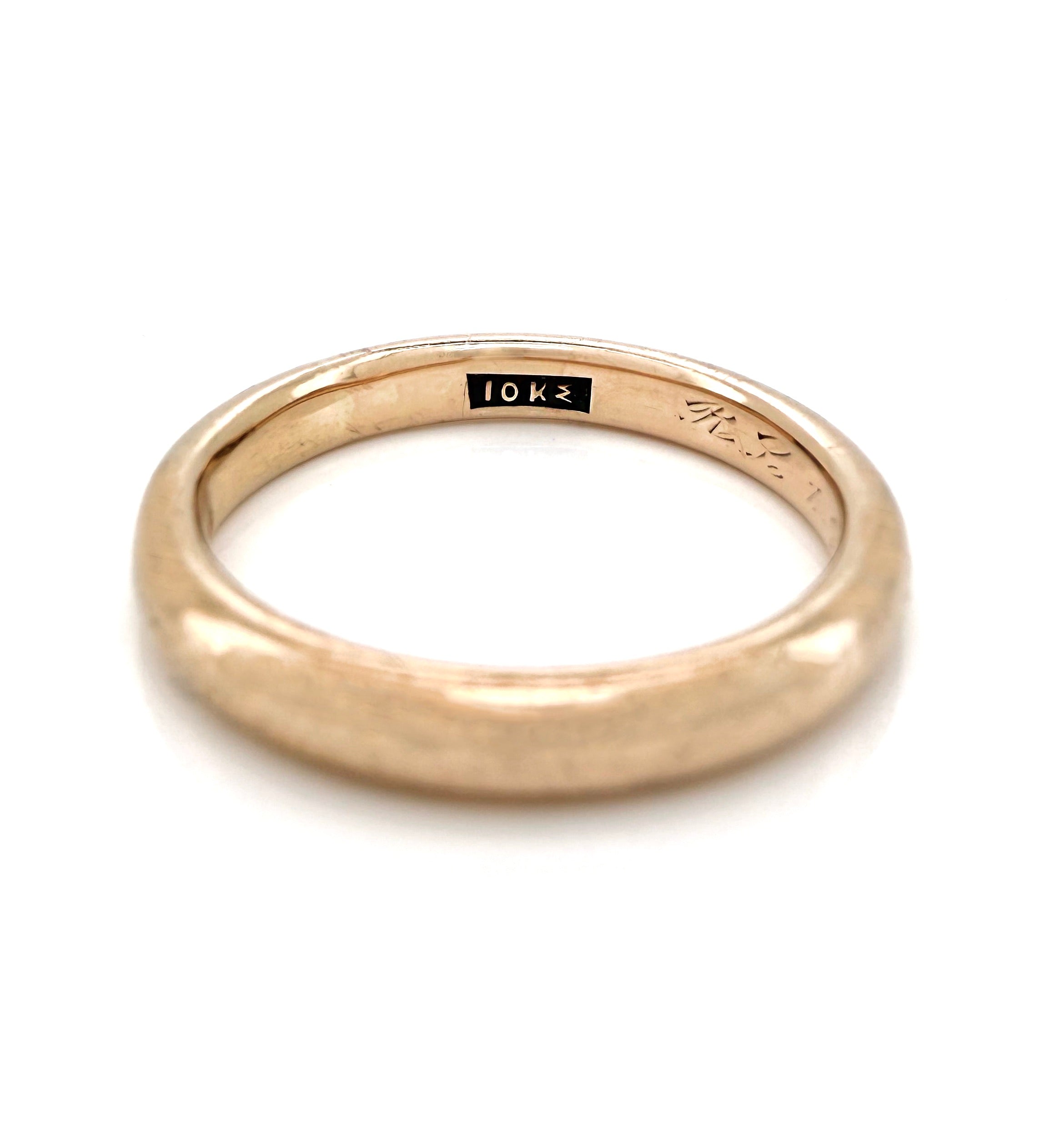 Antique gold ring with '10K' stamp and JR Wood & Son's maker's mark on a white background
